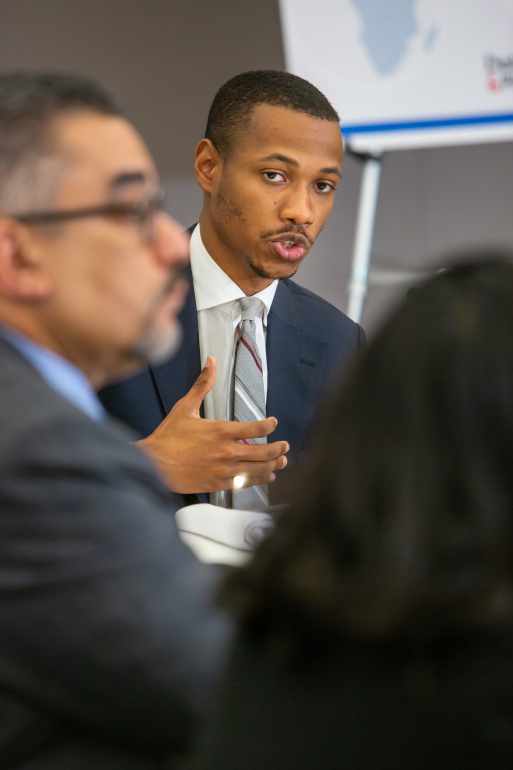 Troy Duffie speaking during a roundtable discussion